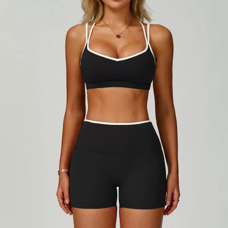 Black sports bra and high-waist shorts set, clean front view