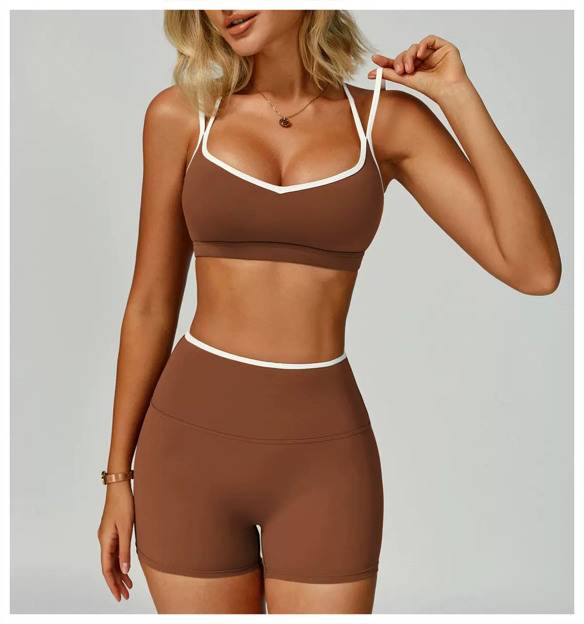 Brown contrast-trim sports bra and high-waist shorts set, front view