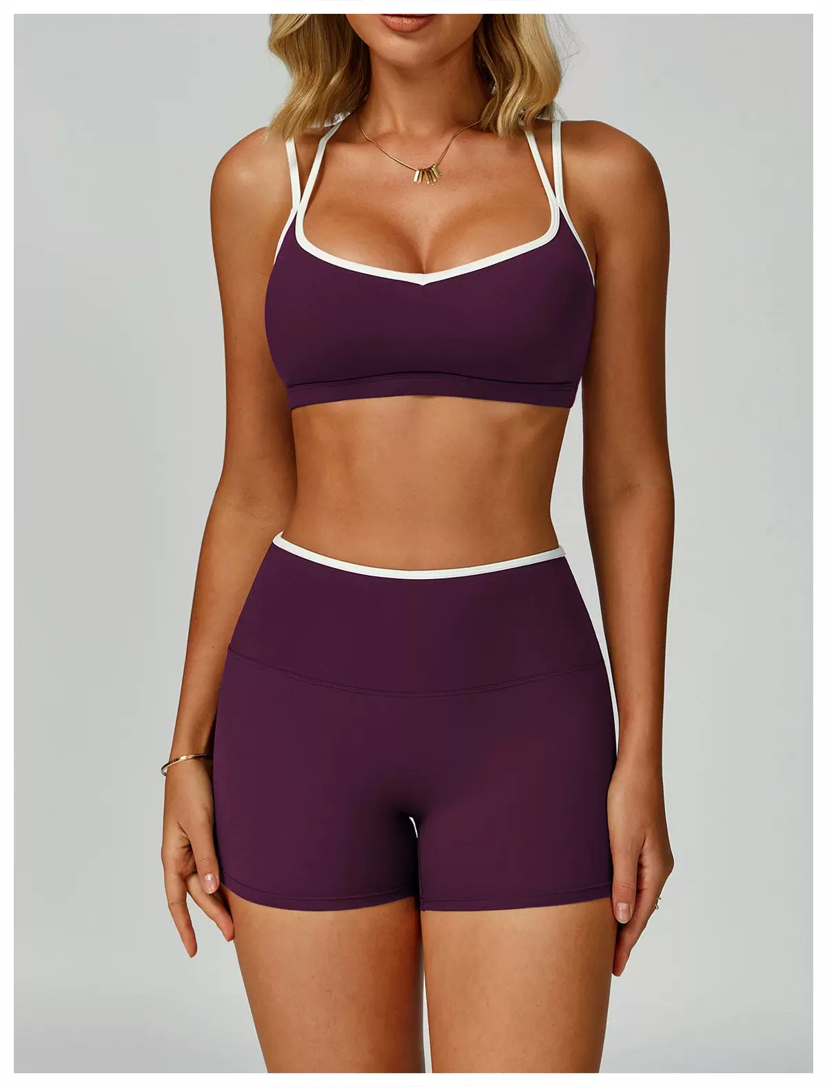 Purple contrast-trim sports bra and high-waist shorts set, front fit view