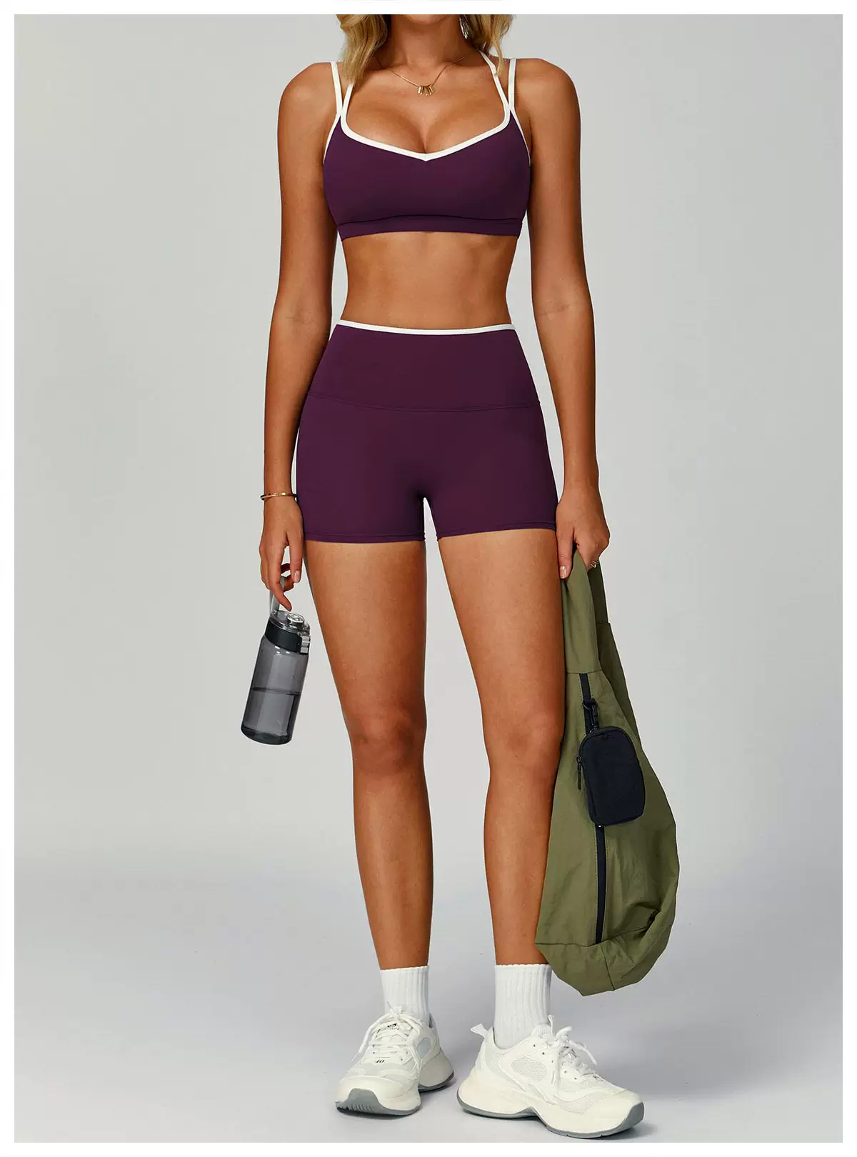 Purple cross-back sports bra and high-waist shorts set, full front view