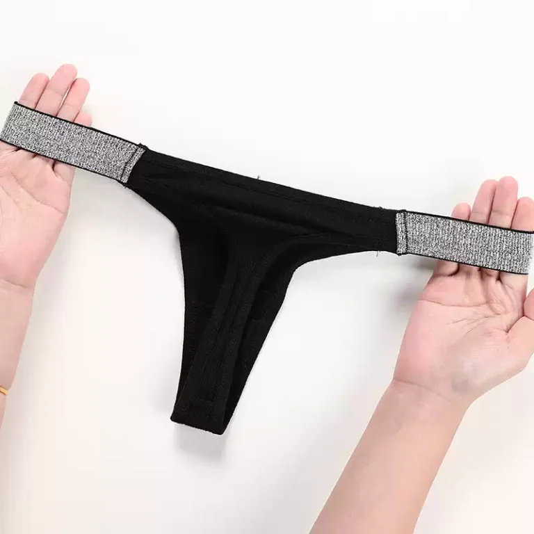 Black thong bottom with flexible silver side bands