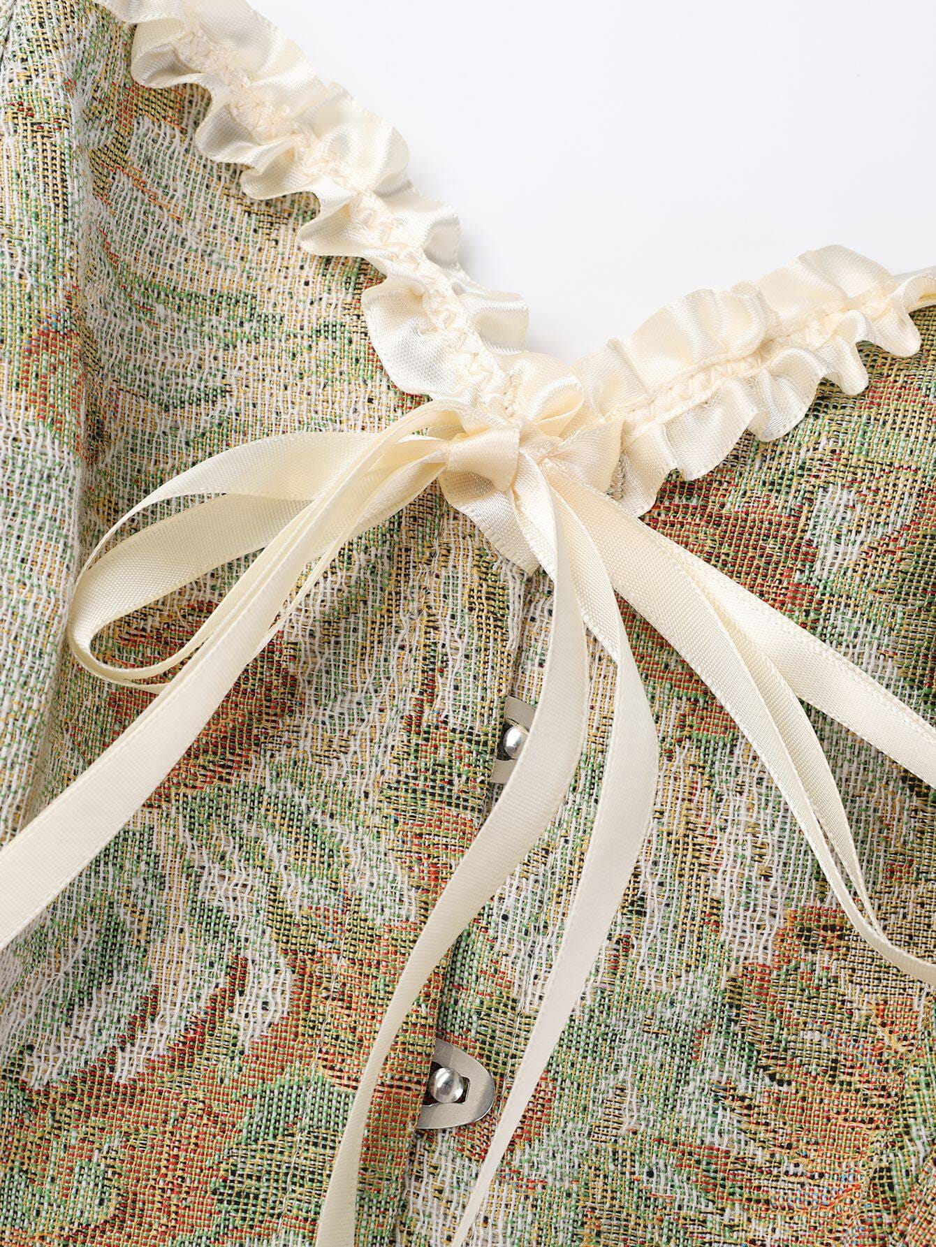 Close view of floral tapestry corset ribbon lacing and ruffled trim