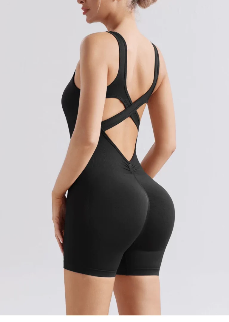 Qinelle black mid-thigh tank bodysuit rear side view with mid-thigh coverage