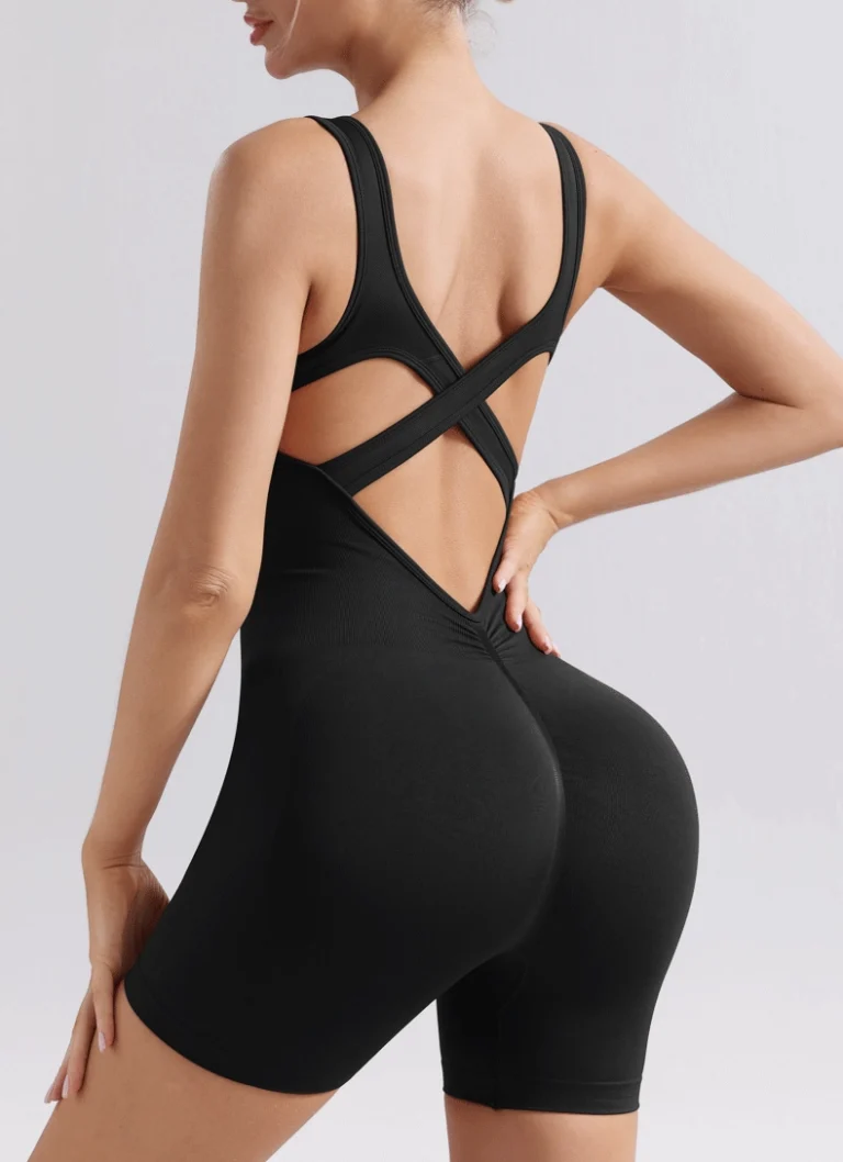 Qinelle black mid-thigh tank bodysuit rear three-quarter view with cross-back straps