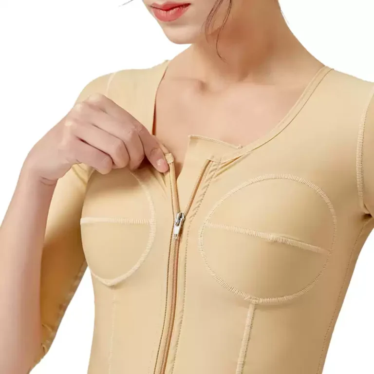 Close-up of beige post-op compression top front zipper