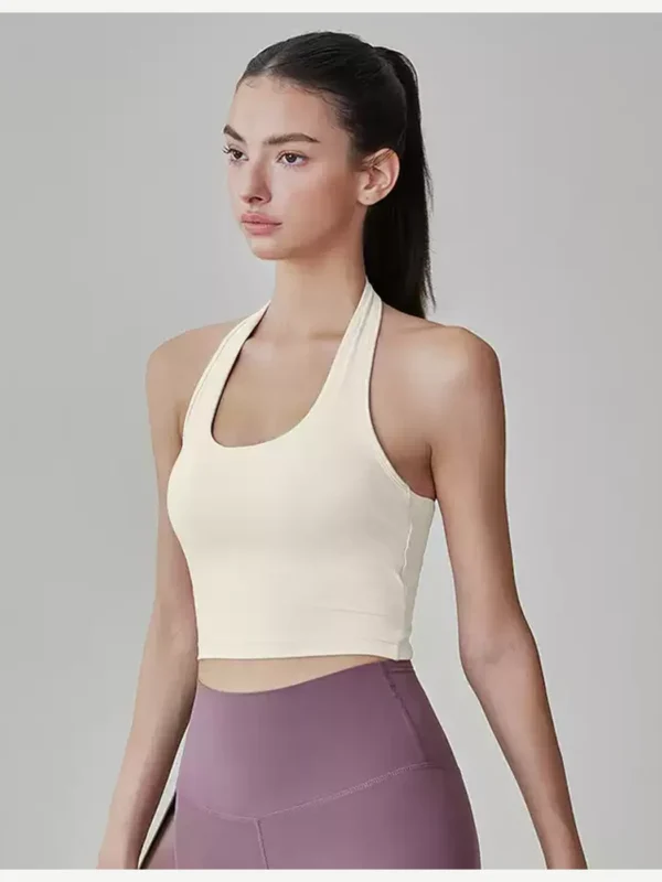 Ivory halter-neck open-back sports crop top front view