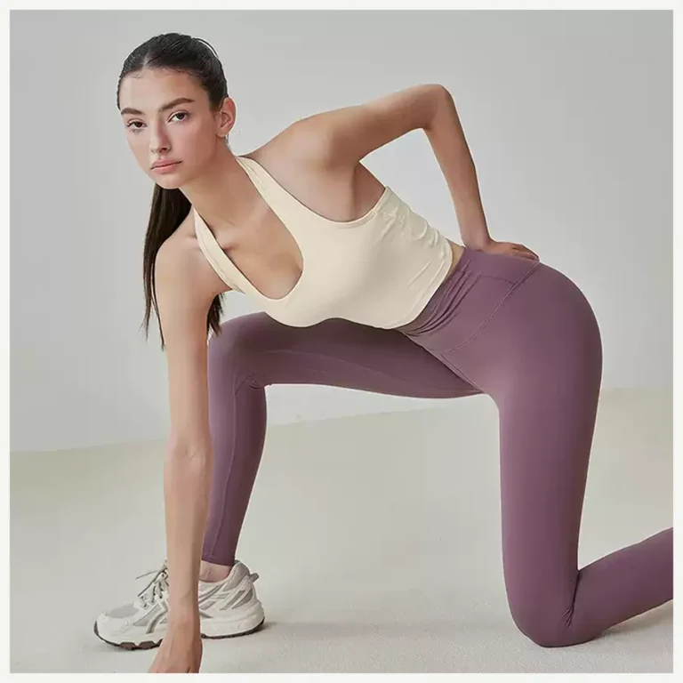 Ivory halter sports crop top during light active movement