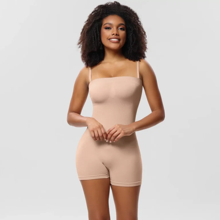 Beige seamless convertible-strap shaping bodysuit with shorts from the front