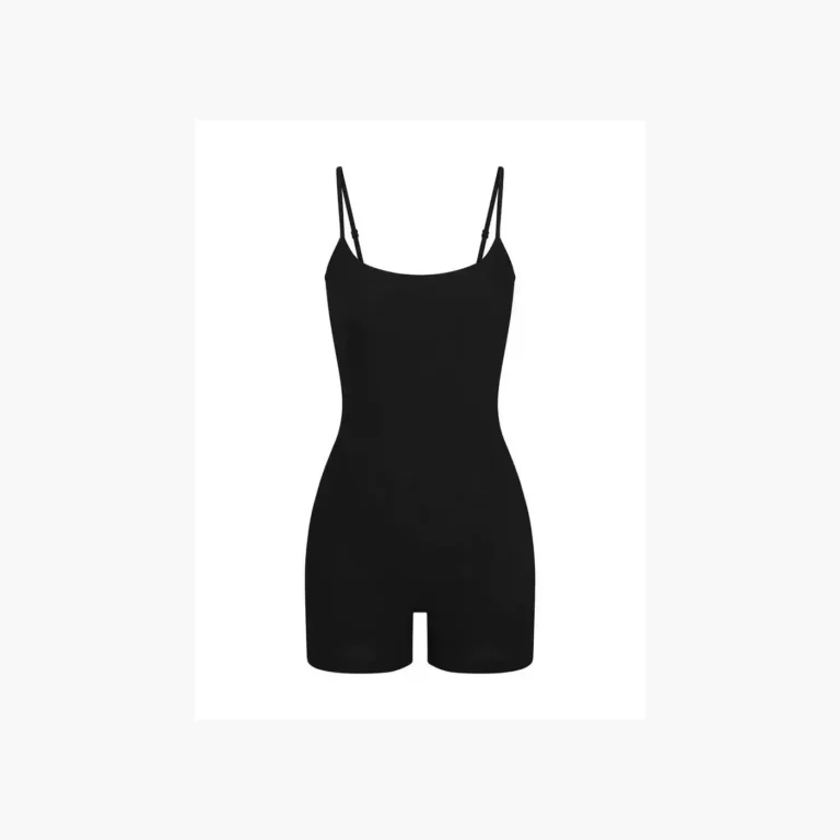 Black seamless convertible-strap shaping bodysuit with shorts laid flat