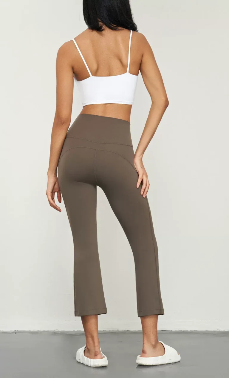 Qinelle high-waist cropped flare yoga pants in Taupe Brown — back view