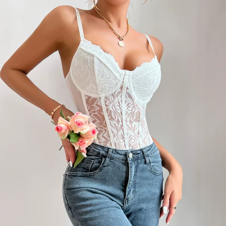 White lace corset bodysuit styled with blue jeans and flowers