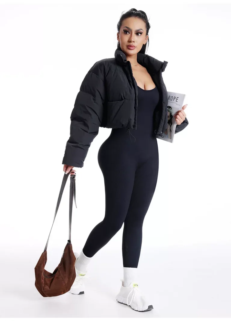 Qinelle seamless ribbed low-back scrunch jumpsuit in Black — front view