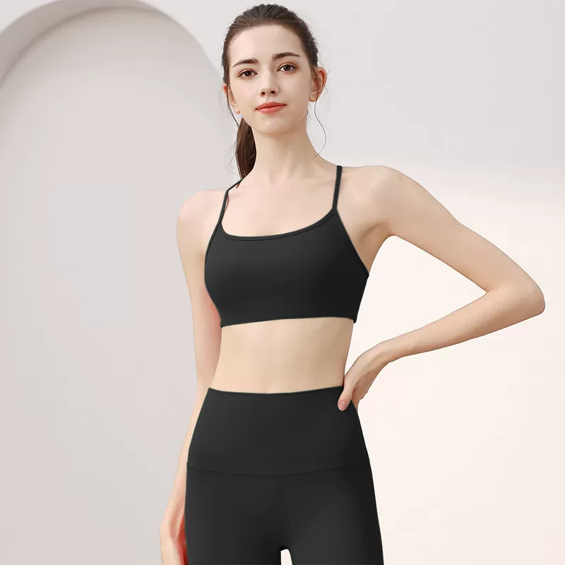 Black scoop-front sports bra crop top, front view