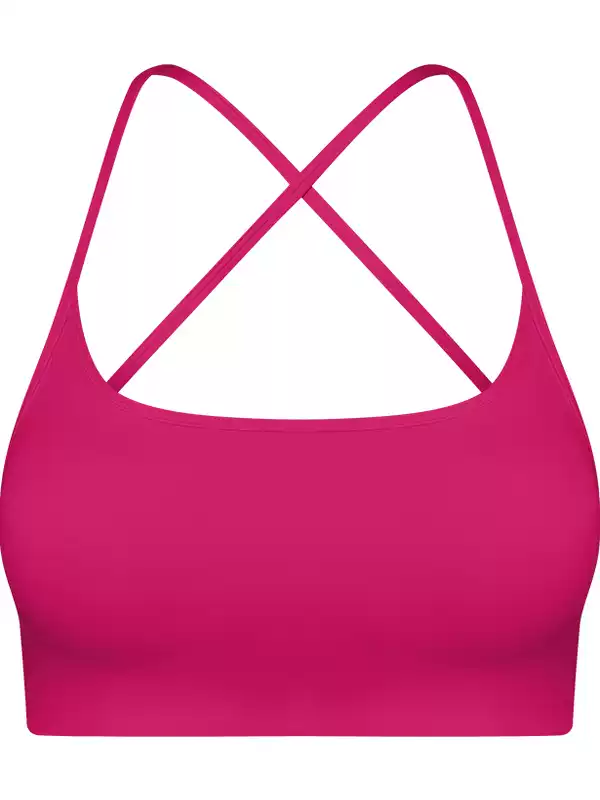 Pink scoop-front crisscross sports bra shown flat