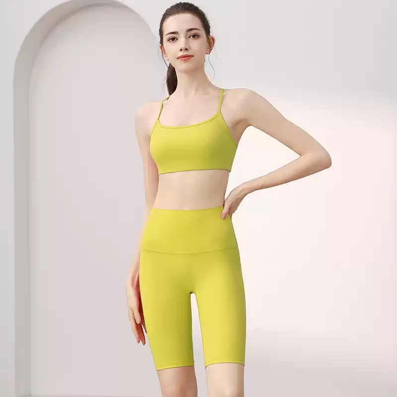 Warm yellow scoop-front sports bra, front view