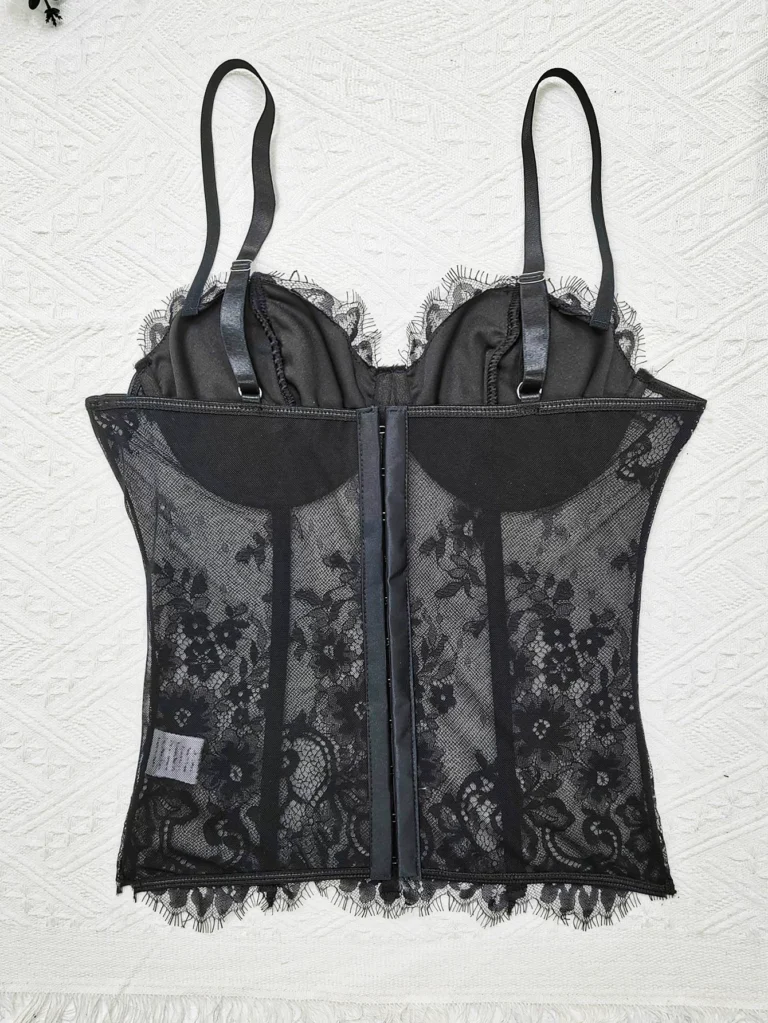 Black floral lace longline bustier flat back view with adjustable straps and rear hook closure