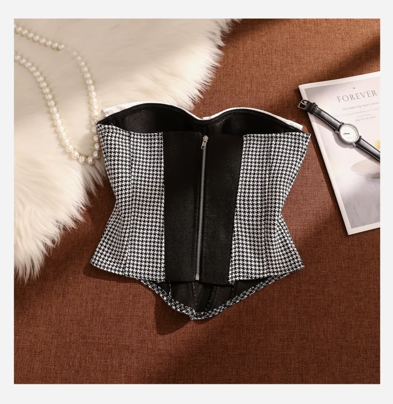 Flat-lay back view of Qinelle houndstooth bustier with center-back zipper