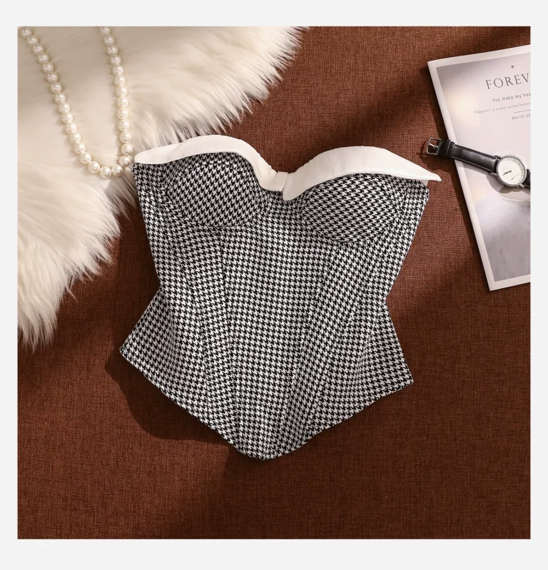Flat-lay front view of Qinelle strapless houndstooth corset bustier top