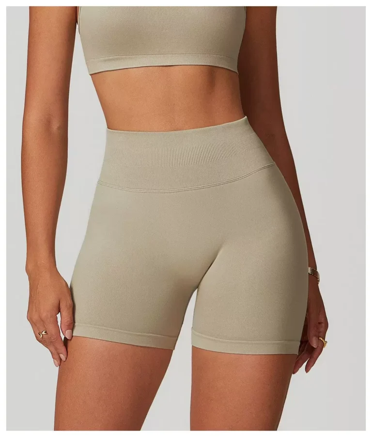 Oat beige high-waist biker shorts rear angle with contour knit placement
