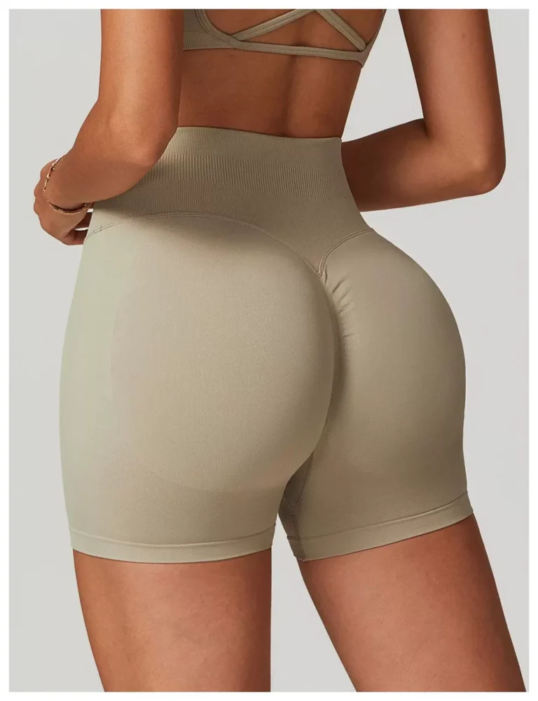 Oat beige seamless biker shorts rear view with V seam and scrunch-back center