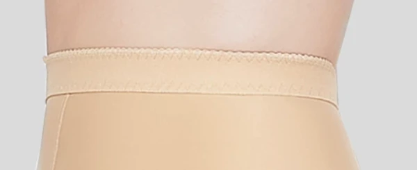 Nude compression leggings wide waistband close-up