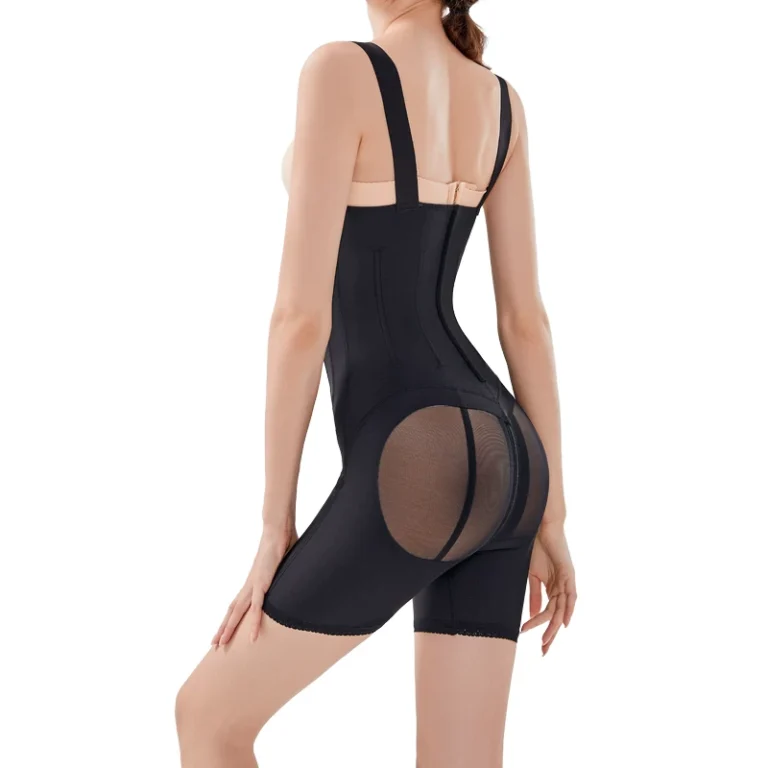 Black post-surgery compression bodysuit rear-side view with buttock openings