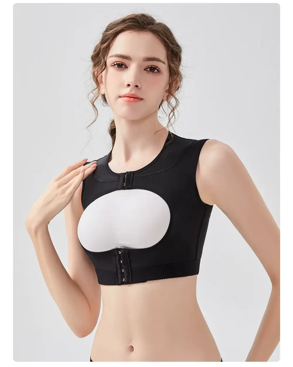 Black open-bust post-surgery support vest front view