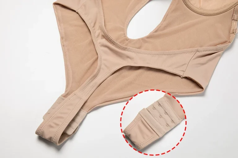 Nude thong bodysuit multi-row hook-and-eye crotch closure detail