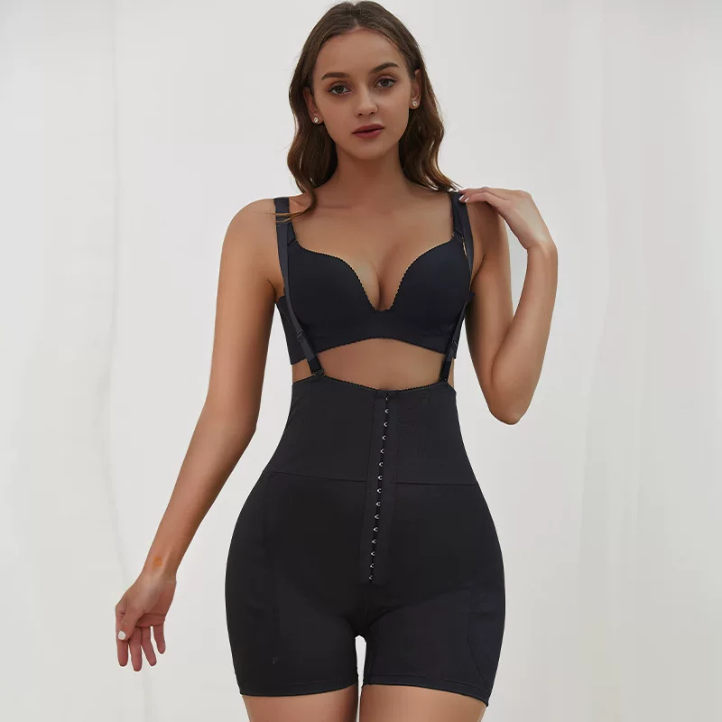 Black high-waist front-hook shaping shorts with removable hip pads, front view