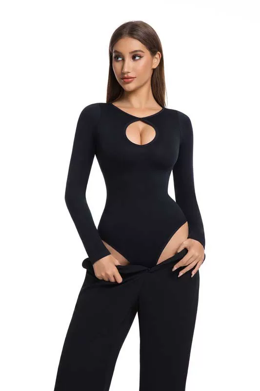 Black keyhole bodysuit styled with trousers