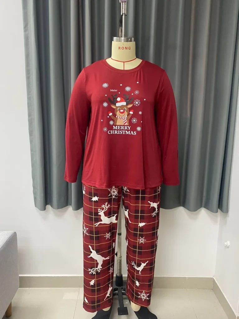 Red Christmas reindeer long sleeve pajama top and plaid pants, mannequin front view