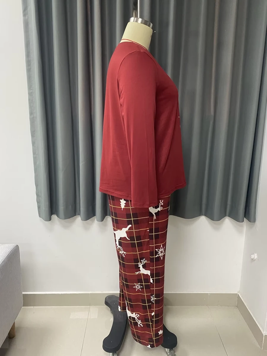 Red Christmas reindeer pajama set with plaid pants, side detail view