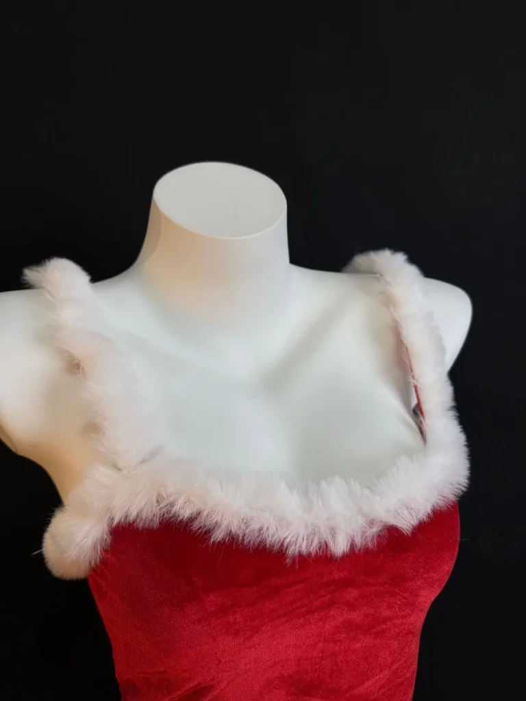 Red Christmas mini dress with soft white plush neckline trim, detail view