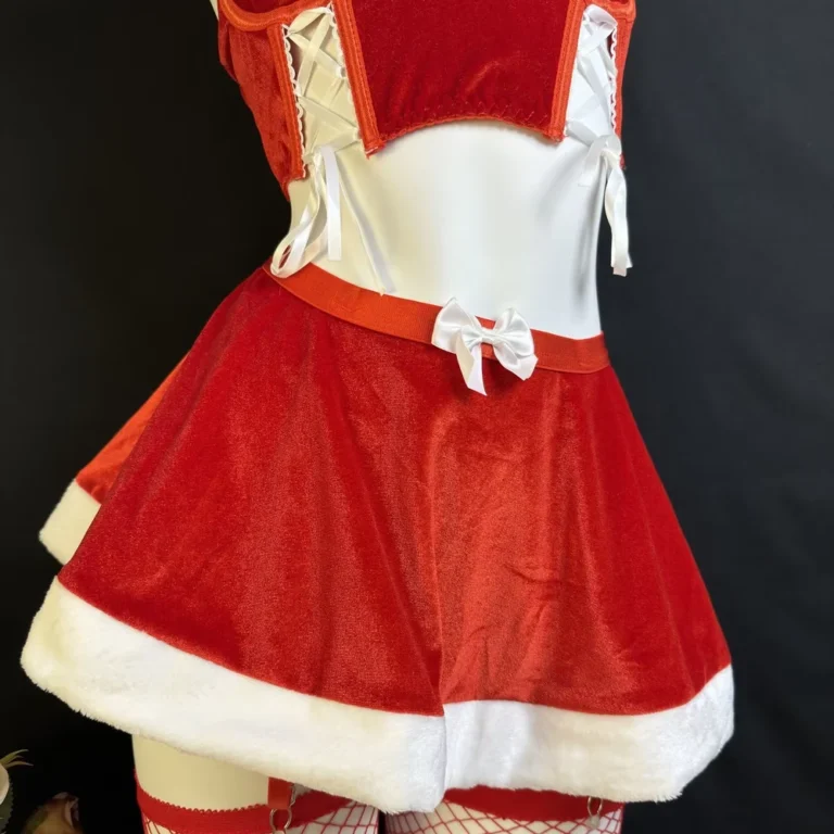 Red velvet Christmas lingerie set showing side lace-up top and mini skirt front detail