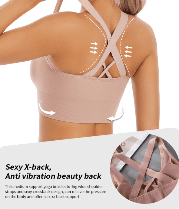 Blush Pink cross-back sports bra detail showing wide crossed straps and longline band